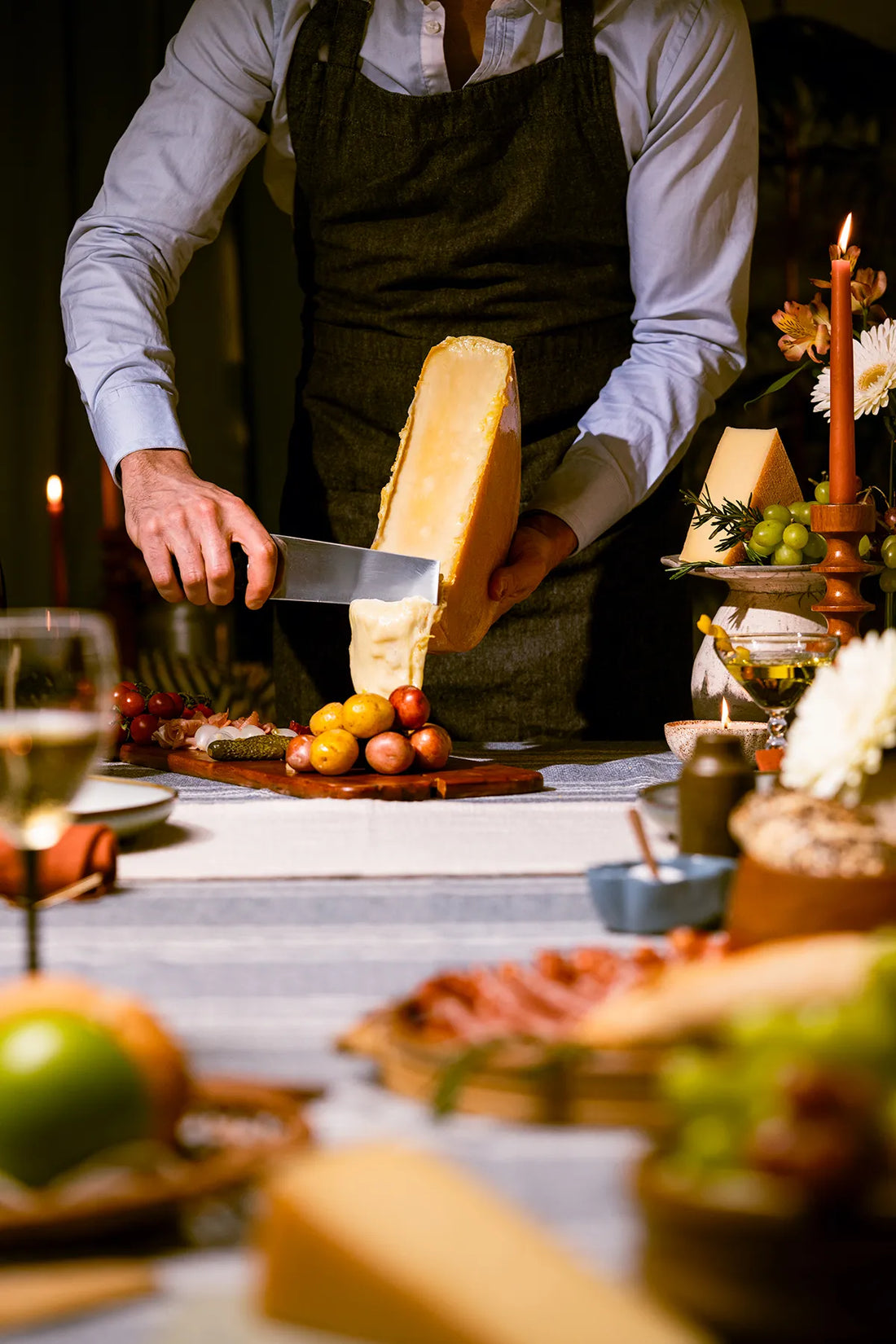 melting cheese over potatoes